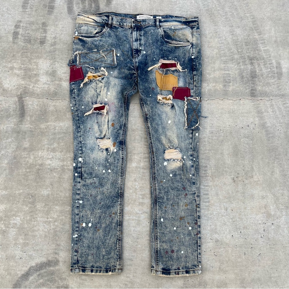 Vintage Evolution in Design Distressed Blue Jeans with patchwork/paint splatter